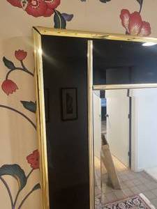 lot 57 image: Postmodern Black & Brass Detailed Hall Mirror