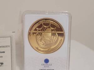 lot 29 image: COA American Mint - Symbols of Freedom Archival Edition - 24k Gold Layered Dollar Coin - D04477