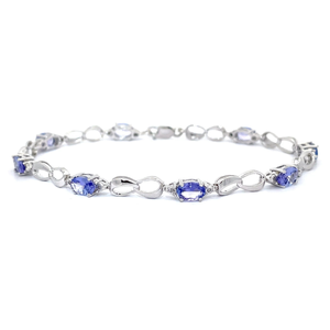 lot 30 image: 3.52 Carat Tanzanite & Diamond Infinity Symbol Loop Link Bracelet