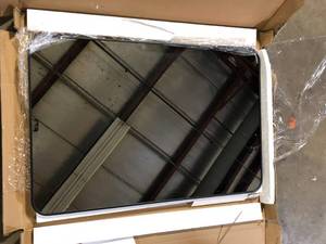 lot 8 image: XRAMFY 24 in. W x 36 in. H Rectangular Aluminum Alloy Framed Rounded Black Wall Mirror  Customer Returns See Pictures