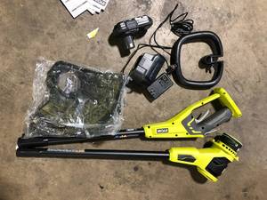 lot 14 image: RYOBI ONE 18V 13 in. Cordless Battery String Trimmer with 2.0 Ah Battery and Charger  Customer Returns See Pictures