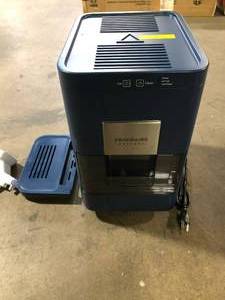 lot 42 image: Frigidaire 10 lb. Freestanding Portable Round 2 in. Whiskey Ball Shaped Ice Maker in Navy    Customer Returns See Pictures