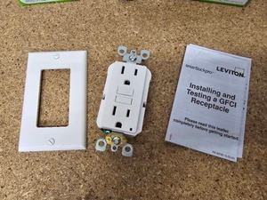 lot 12 image: 4 Leviton Self -Test GFCI Commercial White Outlets with Wallplate