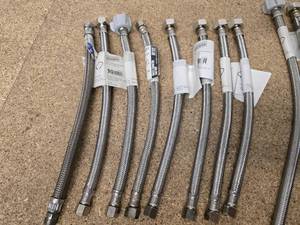 lot 28 image: 15 stainless steel braided supply lines