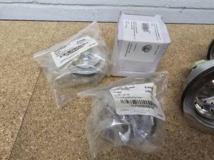 lot 34 image: Variety of stainless steel backet strainers, lift and turn drain assembly, and drain stopper units