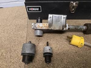 lot 54 image: Socket fusion tool kit with heat tool and various sizes of heads in HOMAK metal tool box