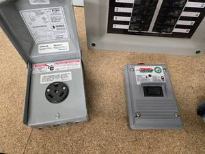 lot 58 image: Misc electrical items - Generac breaker box, Siemens 125V outlet, SmartFilter Alarmed Filter System and misc system