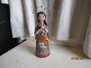 lot 32 image: 12 Mexican Folk Art Clay Woman sta...