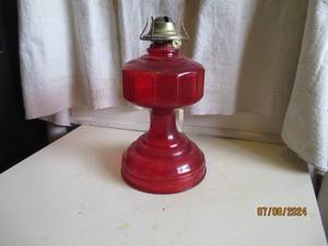 lot 56 image: Vintage Red glass oil lamp base...