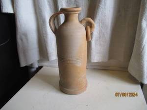 lot 58 image: 15 Hand sculpted clay water pitche...