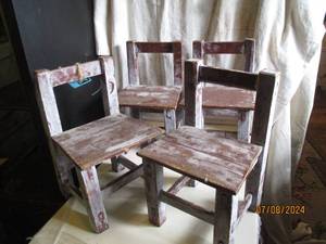 lot 84 image: Set of (4) hand carved doll sized d...