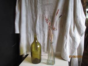 lot 85 image: 15 Amber Glass bottle plus triangu...