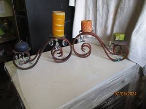 lot 106 image: Heavy duty m3tal framed candle hold...