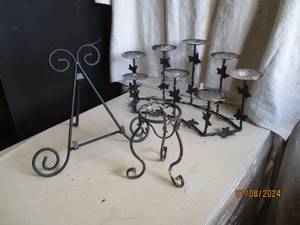 lot 129 image: Matte black and rustic metal candel...