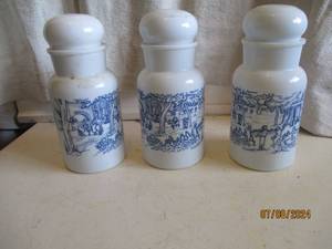 lot 153 image: Set of (3) lidded milk glass canist...