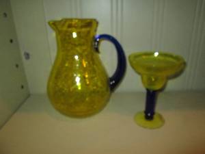 lot 406 image: Unique hand blown Yellow Mexican glass margarita glass and water pitcher with Cobalt blue stem and handle