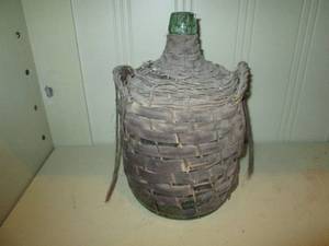 lot 432 image: Vintage onion glass style carboy with Wicker Rattan woven wrapping