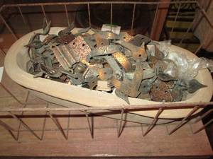 lot 655 image: Metal tray and stoneware tub filled with vintage handles and hinges