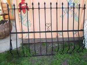 lot 661 image: Black forged steel window protector from Mexico measuring 68 wide 4 tall