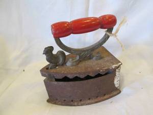 lot 209 image: Antique Charcoal sad iron with wood...