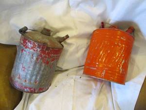 lot 252 image: Pair of metal gas cans each with li...