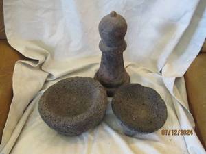 lot 506 image: Pair of hand carved molcajete for grinding corn and a hand carved tall grinder