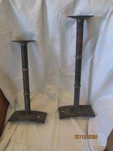 lot 528 image: Pair of heavy metal candle holders