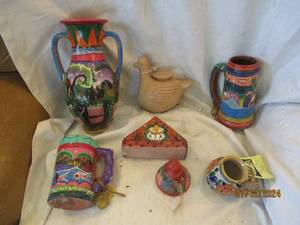 lot 558 image: Decorative earthenware vessels and a chicken figure