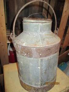 lot 654 image: Antique metal can with lid...