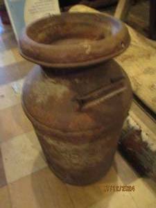 lot 677 image: Milk can with lid...
