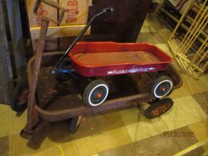 lot 679 image: Large rusty wagon and a smaller Flexible Flyer wagon