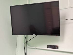 lot 253B image: RCA 32 Wall-Mount TV with Remote Control