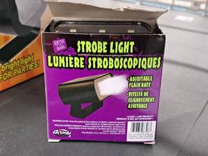 lot 1312 image: Battery Operated Mini Strobe Light (in original box)