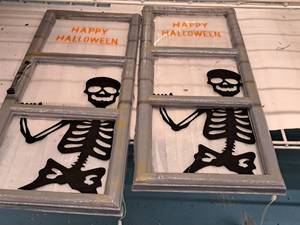 lot 1340 image: Lot of (2) The Gothic Collection w Happy Halloween logo Battery Operated Skeleton-In-Window Halloween Dcor