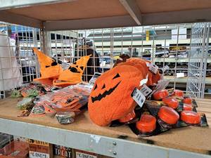 lot 1372 image: Assorted Halloween DcorSupplies - Banners, Baking Cups, Pumpkin Lights, Pumpkin Pillows