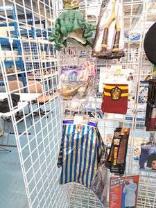 lot 1450A image: Assorted Costume Accessories - Medusa Headpiece, Genie Lamps, Pharoah Hat, Harry Potter Wands & Scarfs, Corset, Knives