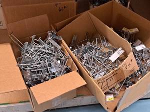 lot 444 image: Lot of (50) 4 Grid Wall Peg Hooks
