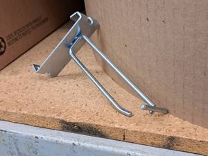lot 449 image: Lot of (50) 4 Grid Wall Peg Hooks