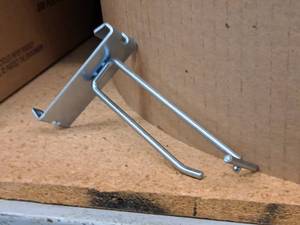 lot 453 image: Lot of (50) 4 Grid Wall Peg Hooks