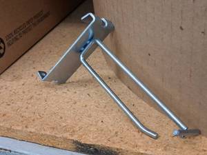 lot 454 image: Lot of (50) 4 Grid Wall Peg Hooks