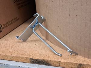 lot 457 image: Lot of (50) 4 Grid Wall Peg Hooks