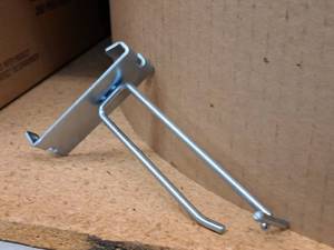lot 459 image: Lot of (50) 4 Grid Wall Peg Hooks