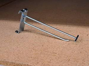 lot 468 image: Lot of (50) 6 Grid Wall Peg Hooks