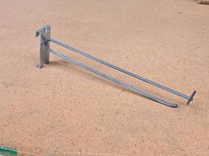 lot 503 image: Lot of (50) 11 Grid Wall Peg Hooks