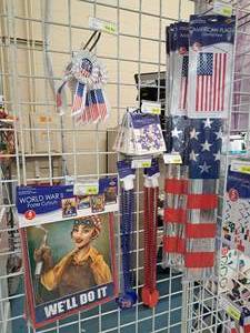 lot 1856 image: Assorted Patriotic Dcor and Accessories - Poster Cut-outs, Door Flags, Beads, Confetti, Ribbons