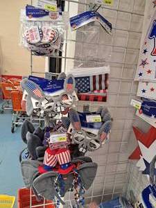 lot 1858 image: Assorted Patriotic Dcor and Novelties - Buttons, Banners, Glasses, Headbands