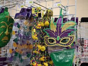 lot 1966 image: Assorted Mardi Gras Party Supplies - Necklaces, Signs, Banners