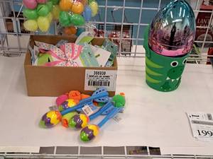 lot 1999 image: Box of Assorted Bows, Assorted Bounce Toys, Cloth Pails, Plastic Eggs