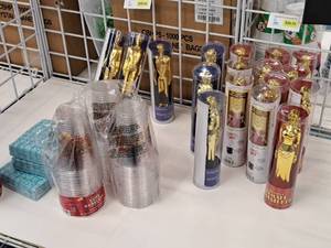 lot 2102 image: Assorted Awards Night MaleFemale Statuettes, Cups, Napkins