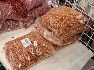 lot 2109 image: Lot of (5 Bags) Orange Metallic Mardi Gras Beads 120-count